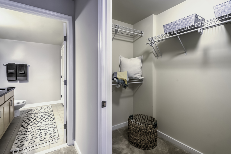 Large walk-in closets with built-in shelving
